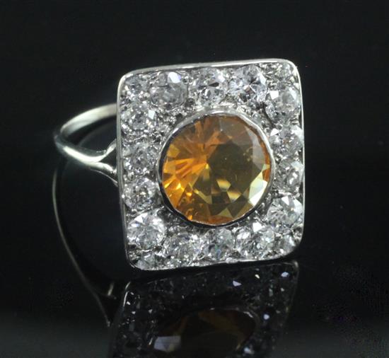 A white gold, fire opal and diamond square cluster ring, size L.